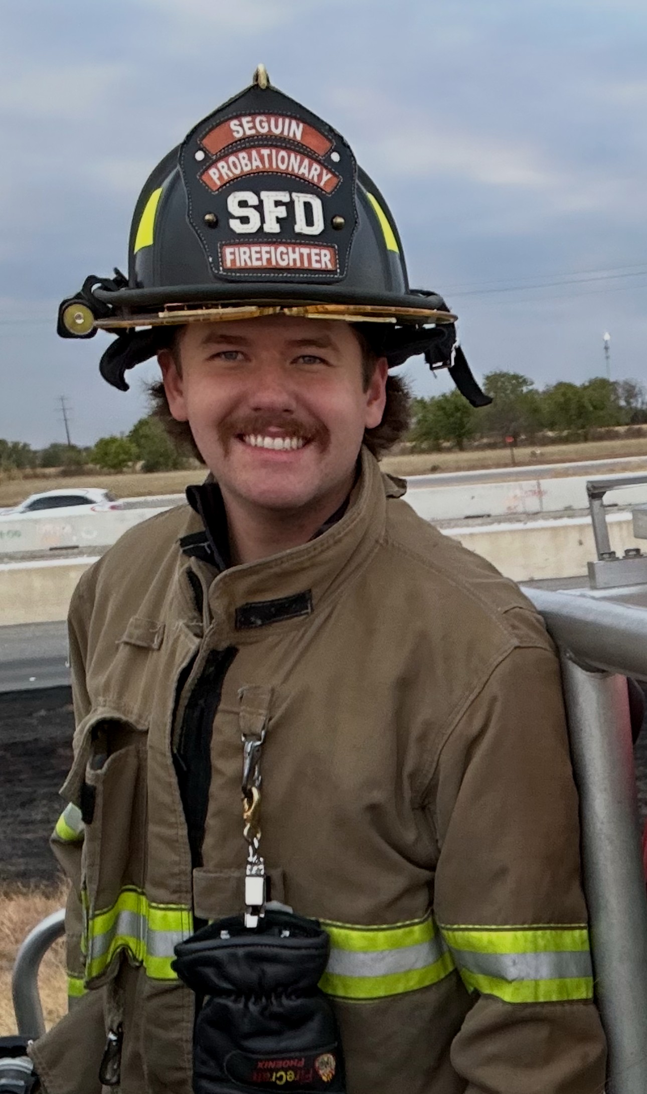 Alec Grandstaff in firefighter turnout gear